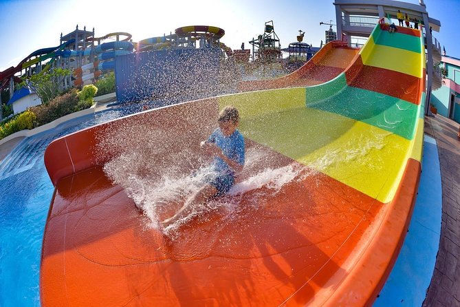 Splash Out Langkawi Beckons! guy riding a water slide