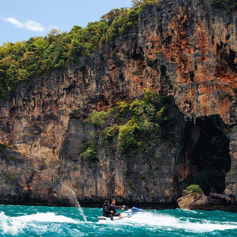 Couple on jet ski ride along Pantai Chenang at Langkawi Jetski and Watersports Tour