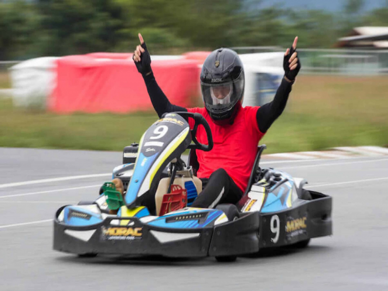 Tourist celebrating a go-kart racing win at Morac Adventure Park Langkawi